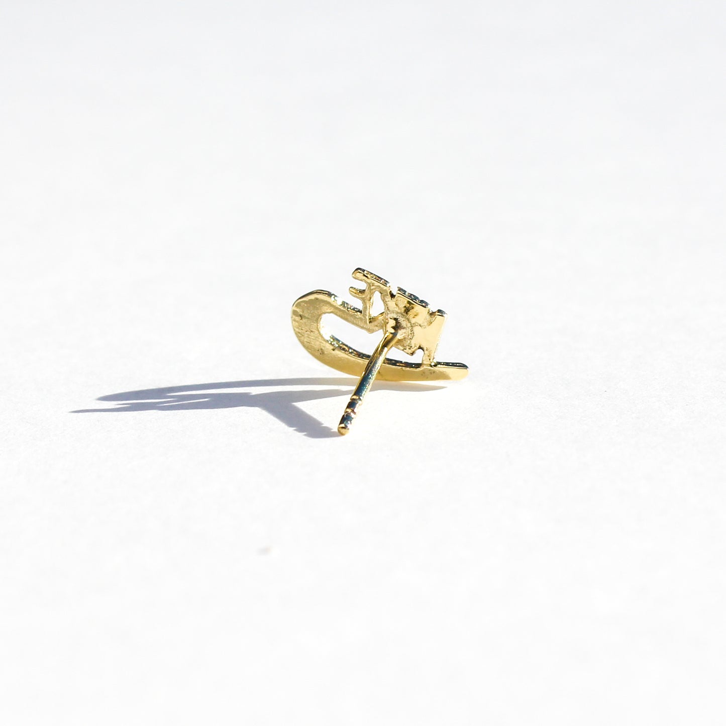 Nike VTG 10kt gold stud earring