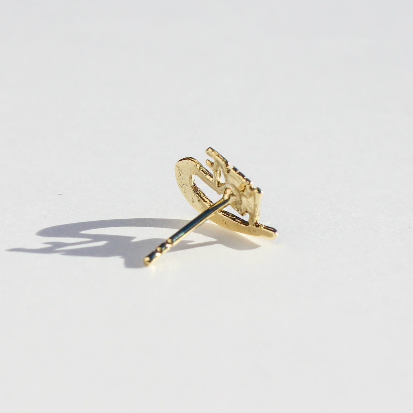 Nike VTG 10kt gold stud earring