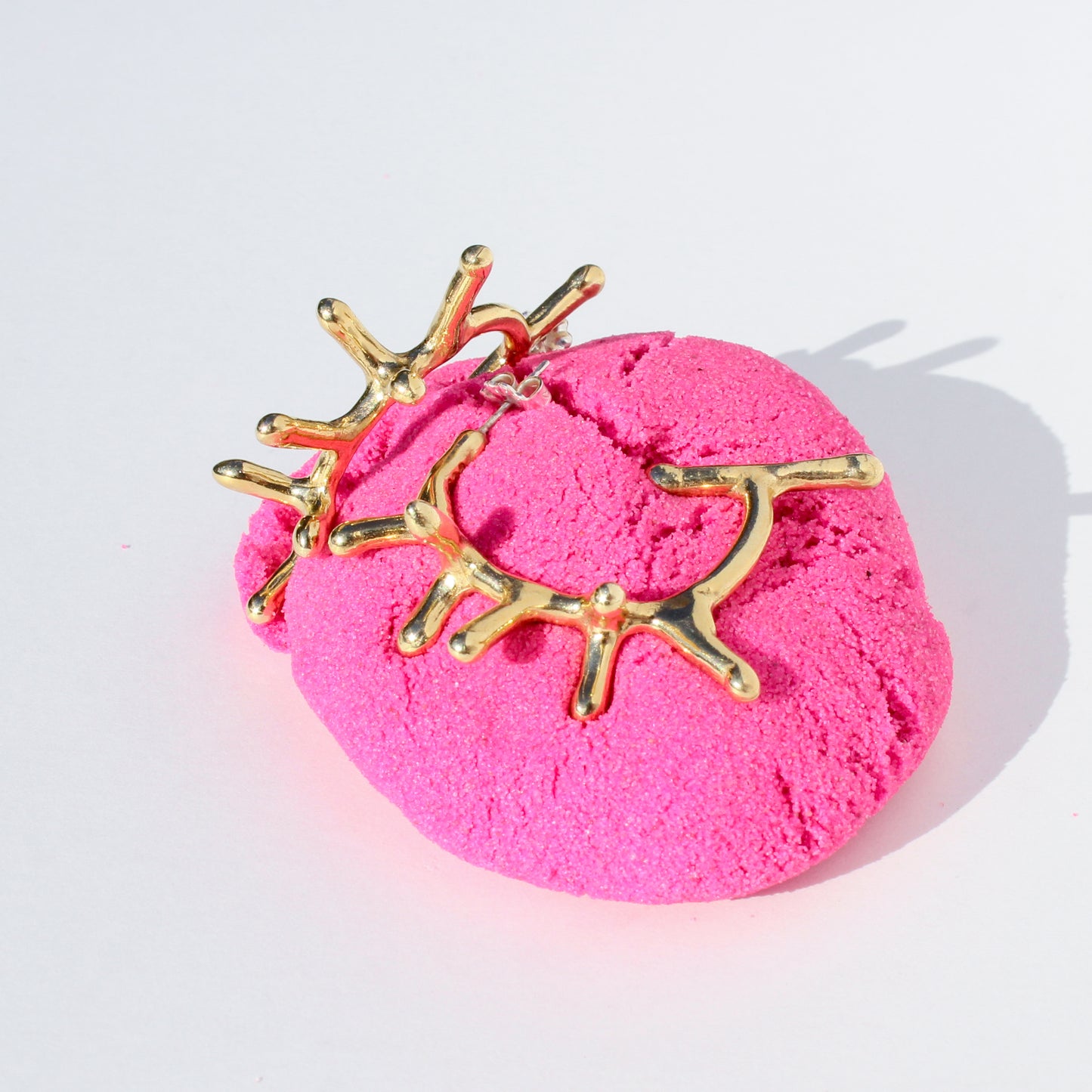 melty spike hoop earrings