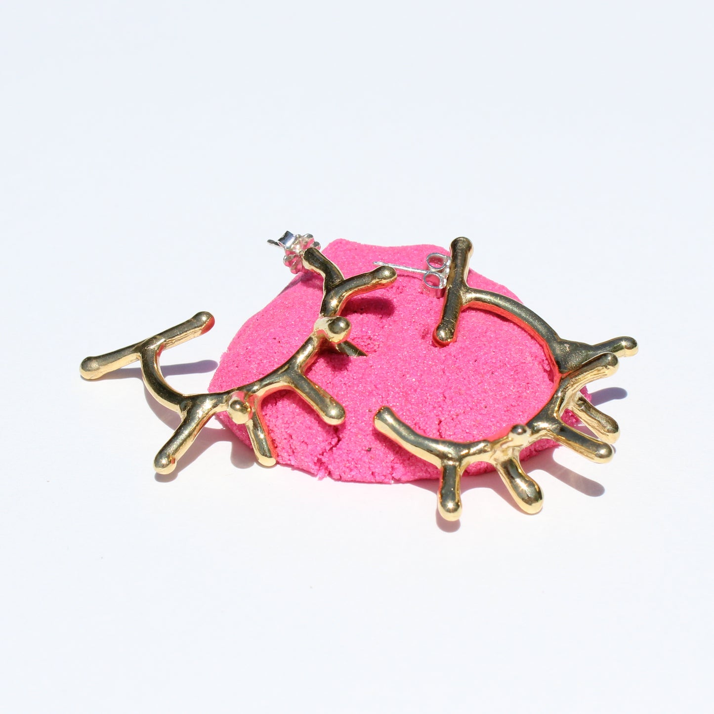 melty spike hoop earrings