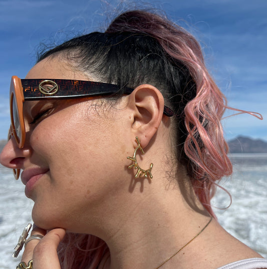melty spike hoop earrings