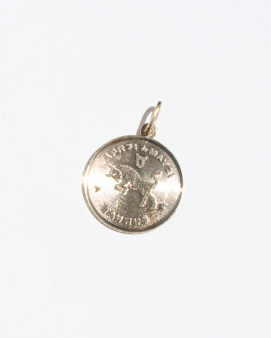 Taurus vtg round machine turned 14kt gold charm