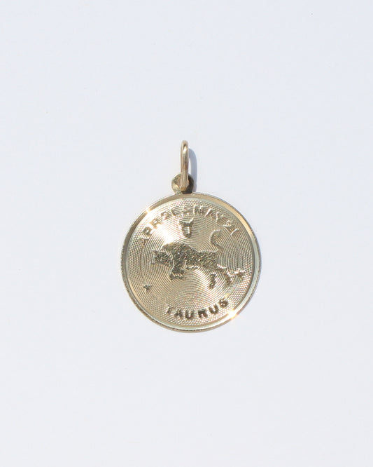 Taurus vtg round machine turned 14kt gold charm