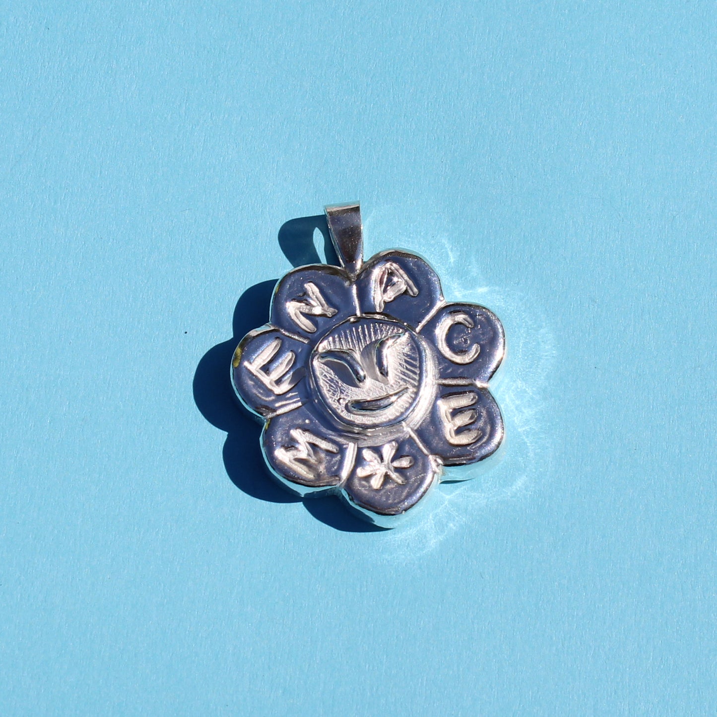 MENACE pendant