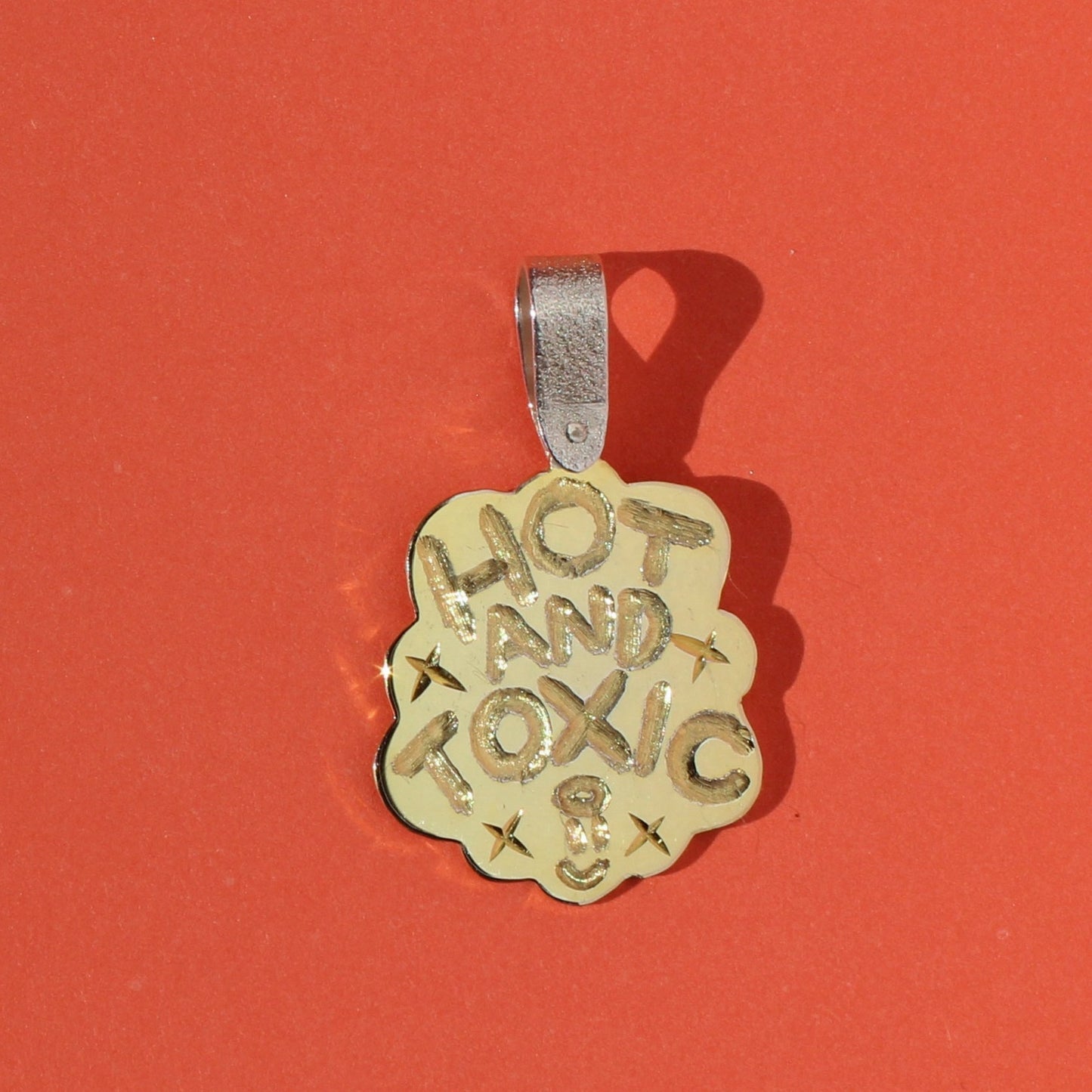 HOT AND TOXIC pendant