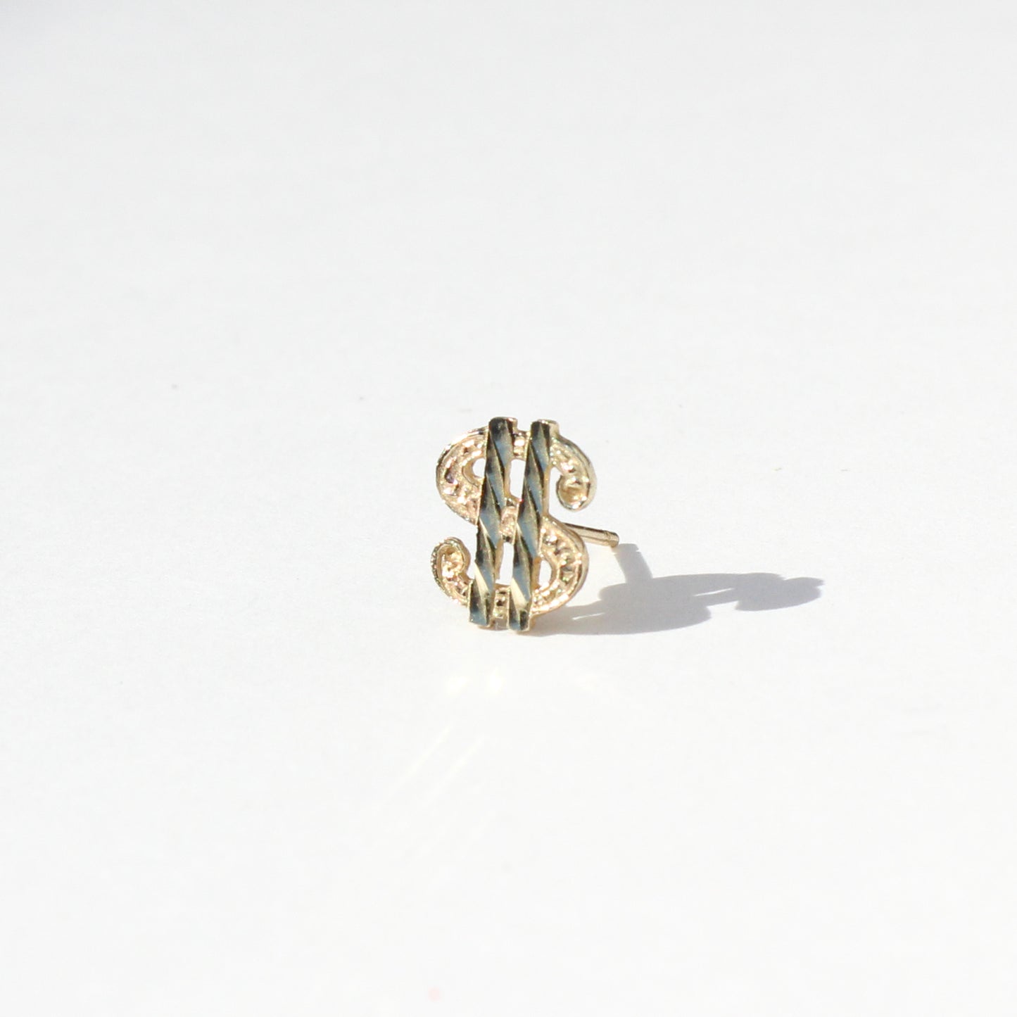 dollar $ign preloved 10kt gold stud earring